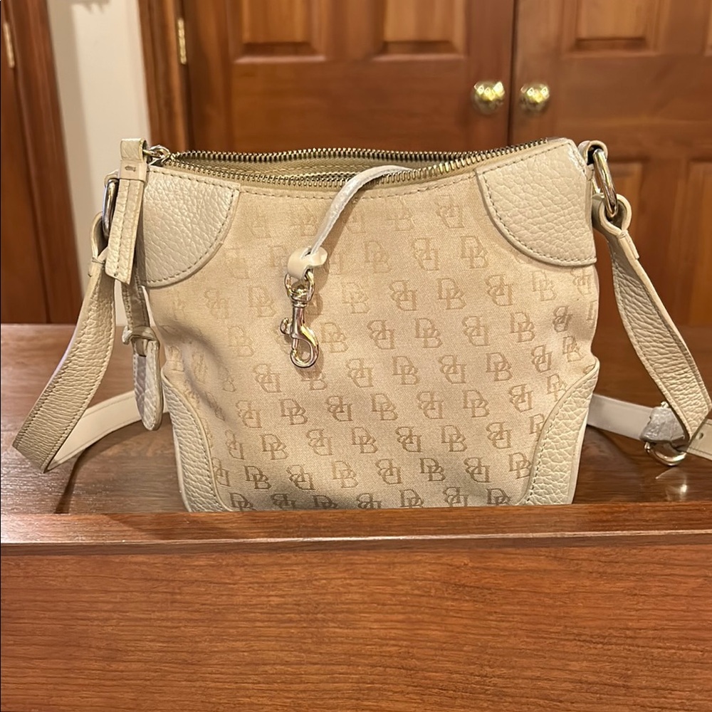Dooney & Bourke Cream Crossbody Bag with Monogram Pattern